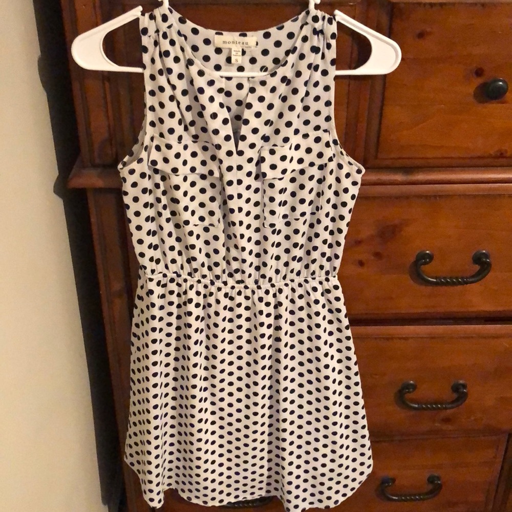 Black and white sleeveless polka dot dress